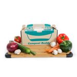 Compost Buddy by Bin Doctor displayed on cutting board decorated with various produce